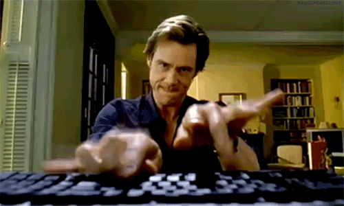 Bruce Almighty clambering at the keyboard