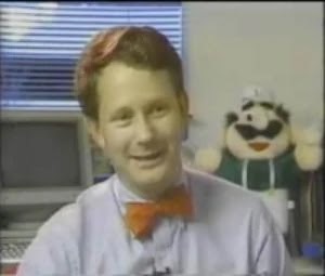 Howard Phillips dons his signature bowtie and tells Miyamoto that SMB2 (JP) sucks.